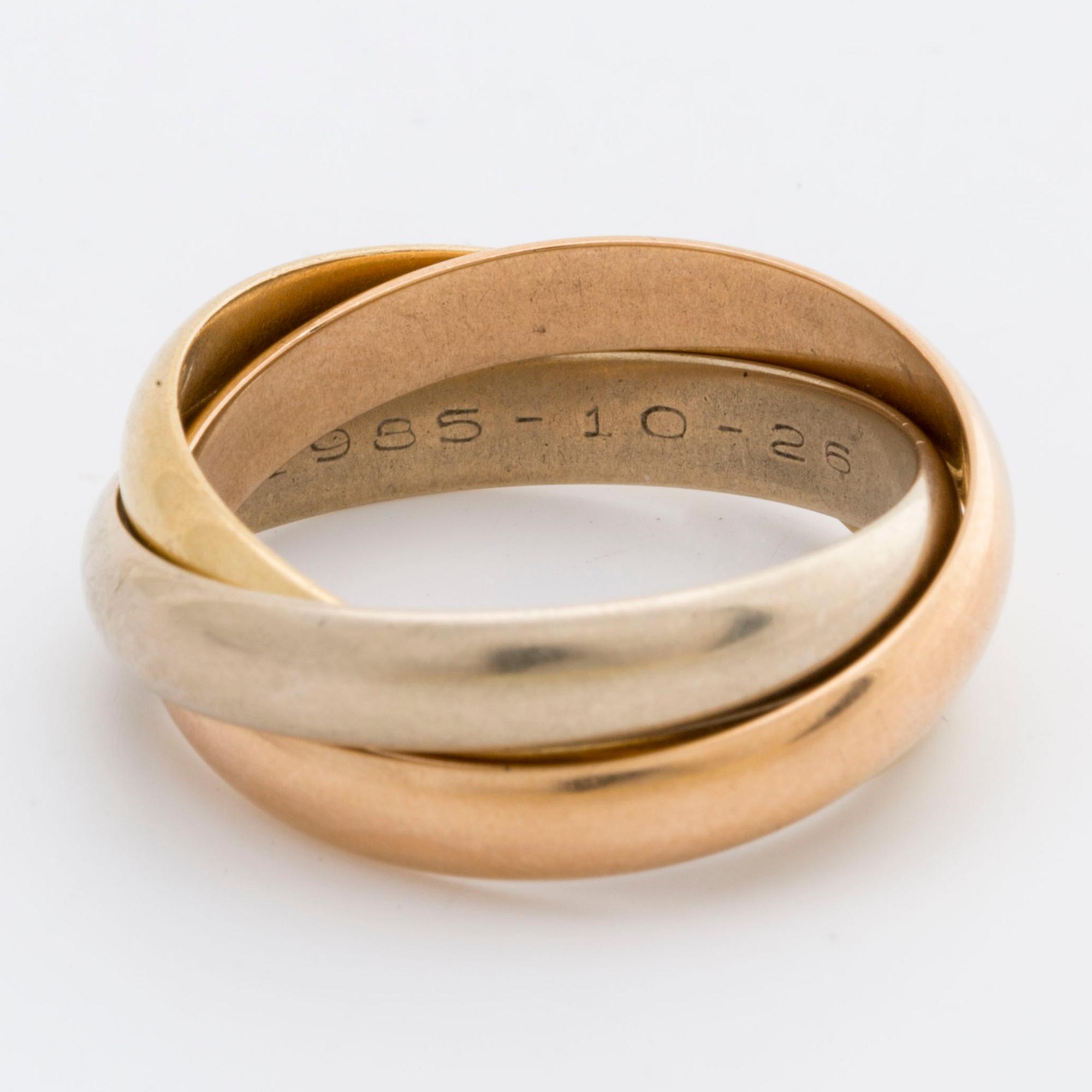 CARTIER, RING, "Trinity" le must de Cartier, 18 K tre-färgat guld.