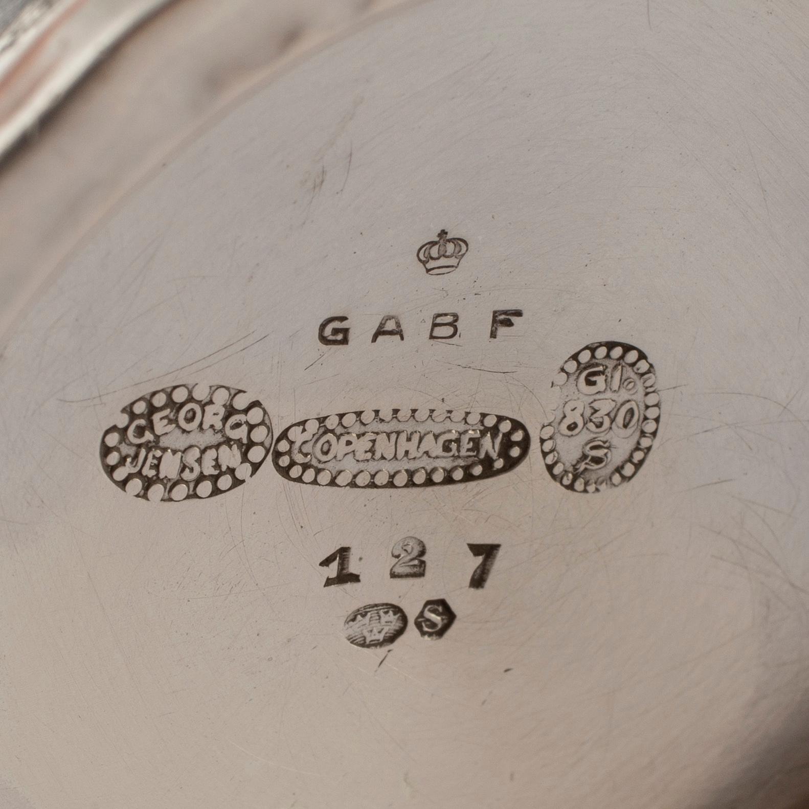 GEORG JENSEN,  a 830/1000 silver mug and  a bowl (a christening set), Copenhagen ca 1918-1927, design nr 127, 158.