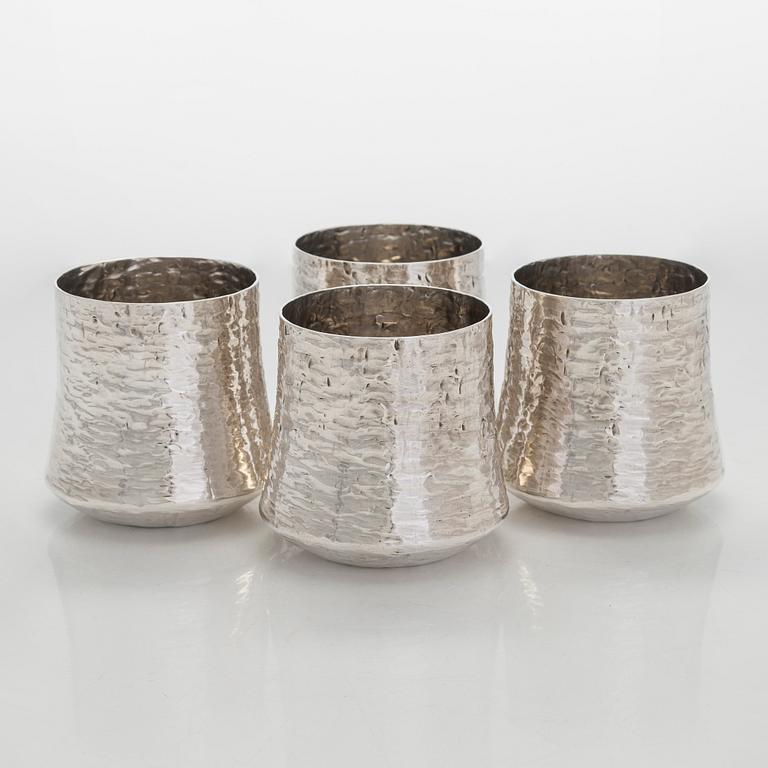 Tapio Wirkkala, four silver beakers, and a rosewood and sterling silver tray, Kultakeskus, Hämeenlinna 1973-74.
