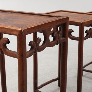 A three-piece hardwood nesting table, China, late Qing dynasty.