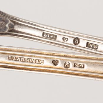 An 39-piece Swedish silver cutlery, majority with mark of L. Larson & Co, Gothenburg, 1854-59.