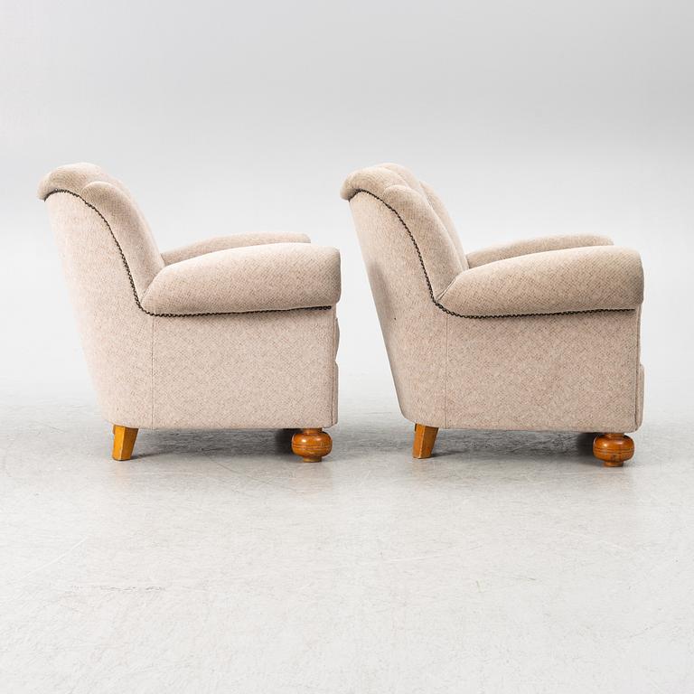 A pair of Swedish modern armchairs, first half of the 20th century.