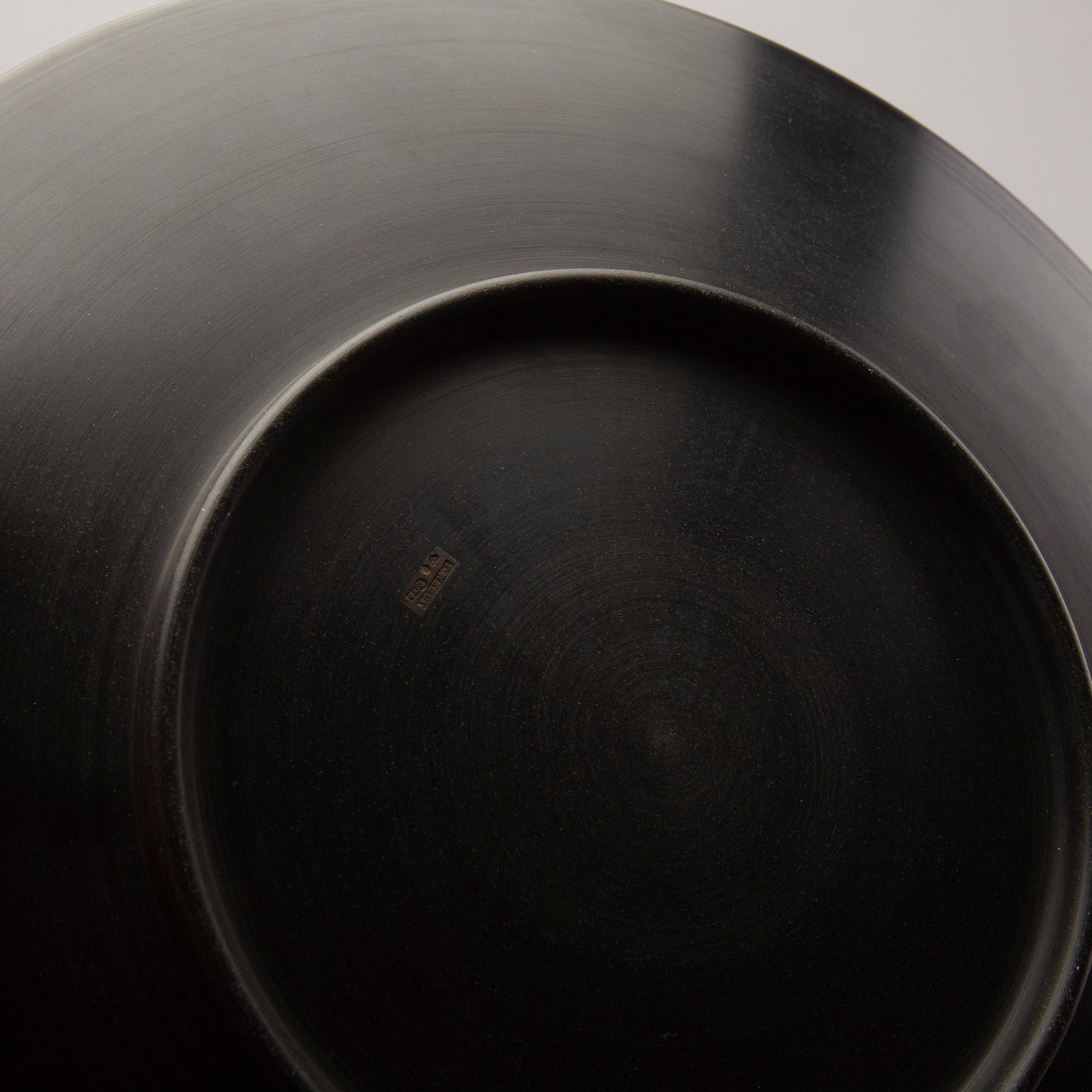 A Swedish 20th century set of 14 plates in bakelite and silver mark of T Wendt Helsingborg 1945.