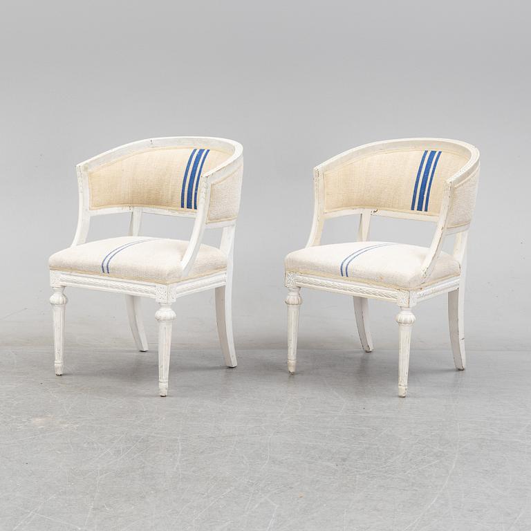A pair of Gustavian style armchairs from around year 1900.