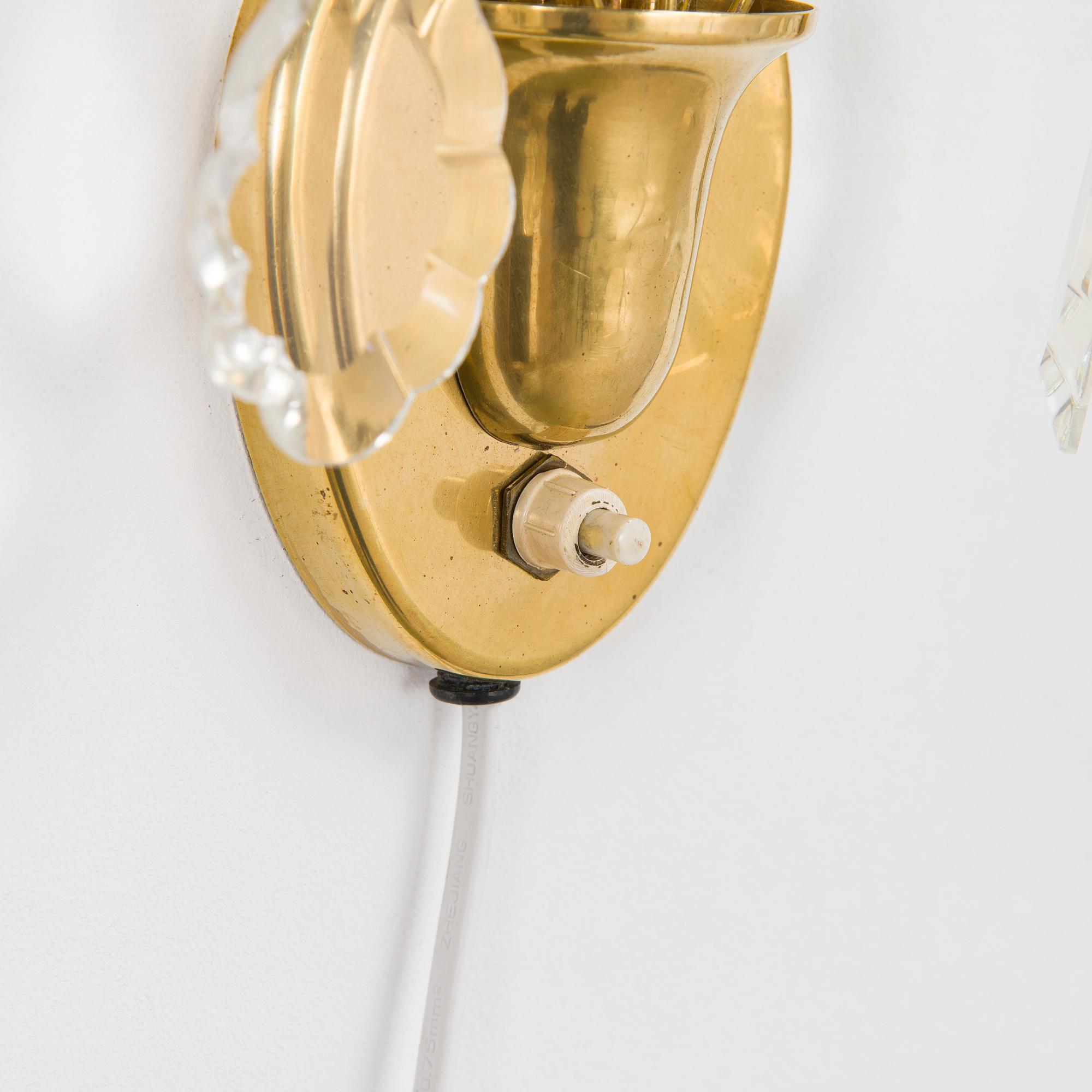 A pair of mid-20th century wall lights, Valinte, Finland.