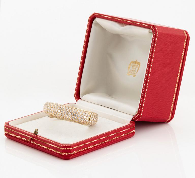 Cartier armring 18K guld med runda briljantslipade diamanter.