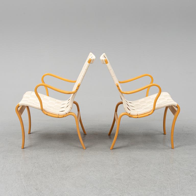 BRUNO MATHSSON, a pair of 'Mina' armchairs from Bruno Mathsson International, Värnamo, 1997.