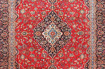 A Kashan carpet, c. 412 x 300 cm.