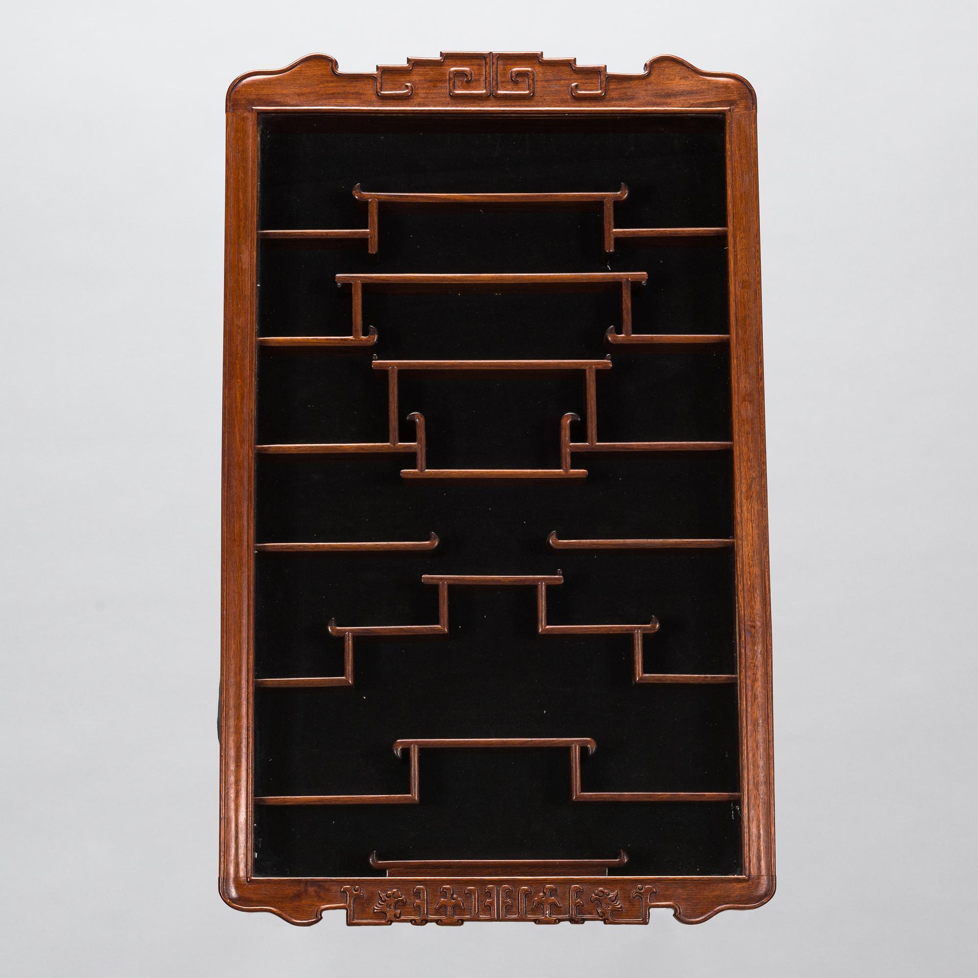 A Chinese 20th century hardwood wall cabinet.