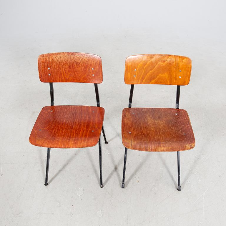 A pair of Friso Kramer Industrial 1950s chairs.