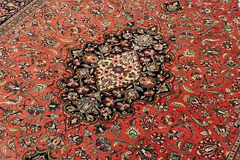 A 1960's silk Qum carpet, c. 305 x 205 cm (as well as 4 and 2 cm of flat weave on each side).