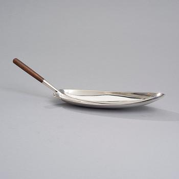 TAPIO WIRKKALA, A SILVER DISH WITH A WOODEN HANDLE. Stamped TW, Kultakeskus, Hämeenlinna 1957.