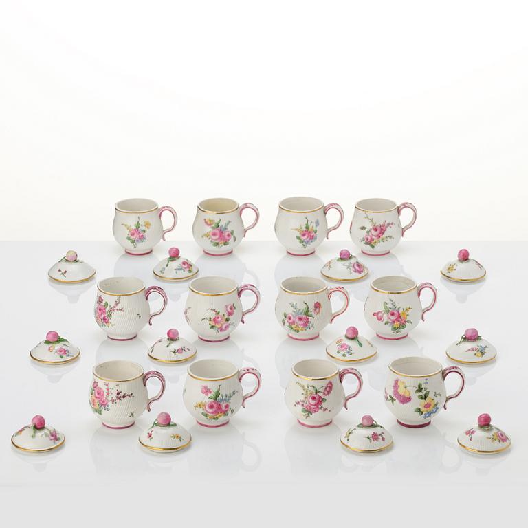 A set of 12 Swedish Marieberg custard cups with covers, 18th century.