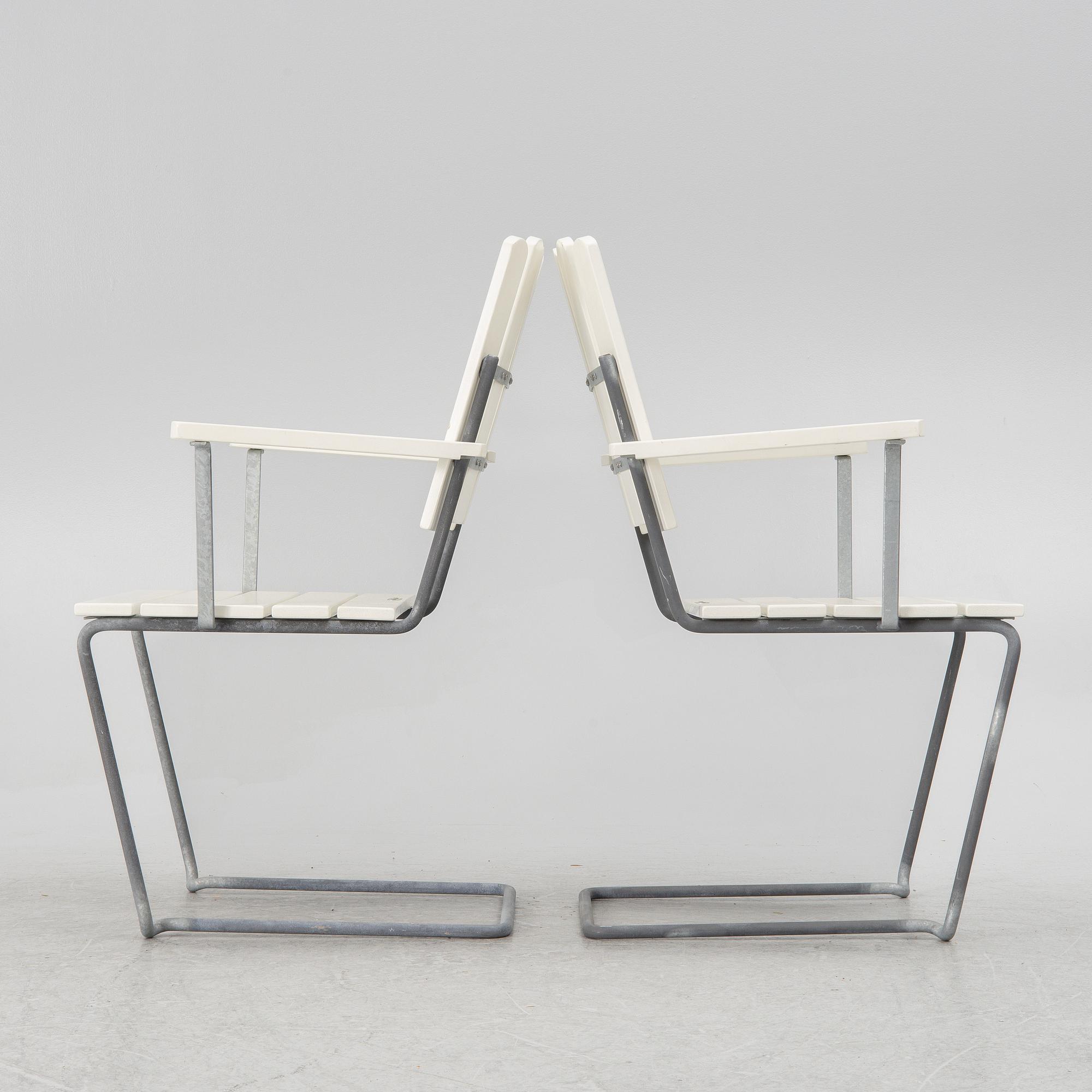 Arthur Lindquist, four armchairs model A2 and a table 9A, Grythyttan's steel furniture.