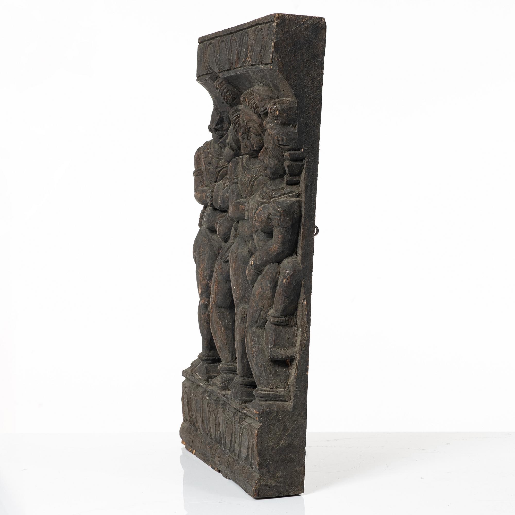 A Southeast Asian wooden panel, 20th century.