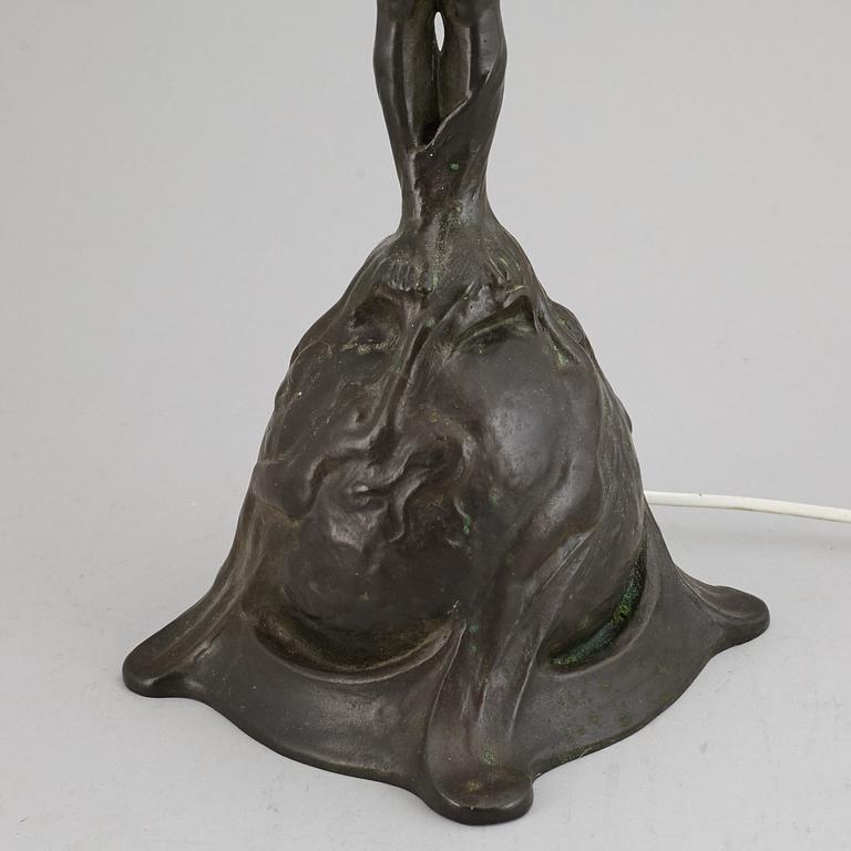GERDA SPRINCHORN, an Art Nouveau green patinated bronze lamp "The Sun", Herman Bergman, Stockholm, early 20th century.
