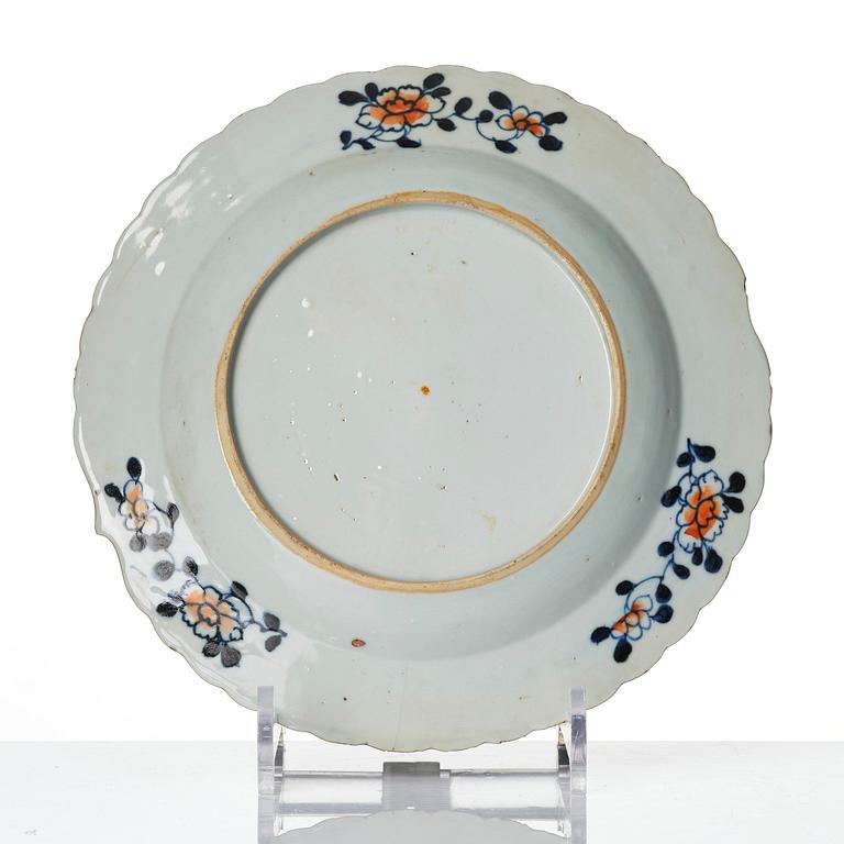 A set of three famille rose 'tobacco leaf' plates, Qing dynasty, Qianlong (1736-95).