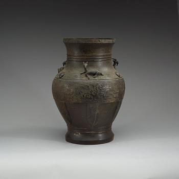 A large bronze vase, presumably late Ming dynasty (1368-1644).