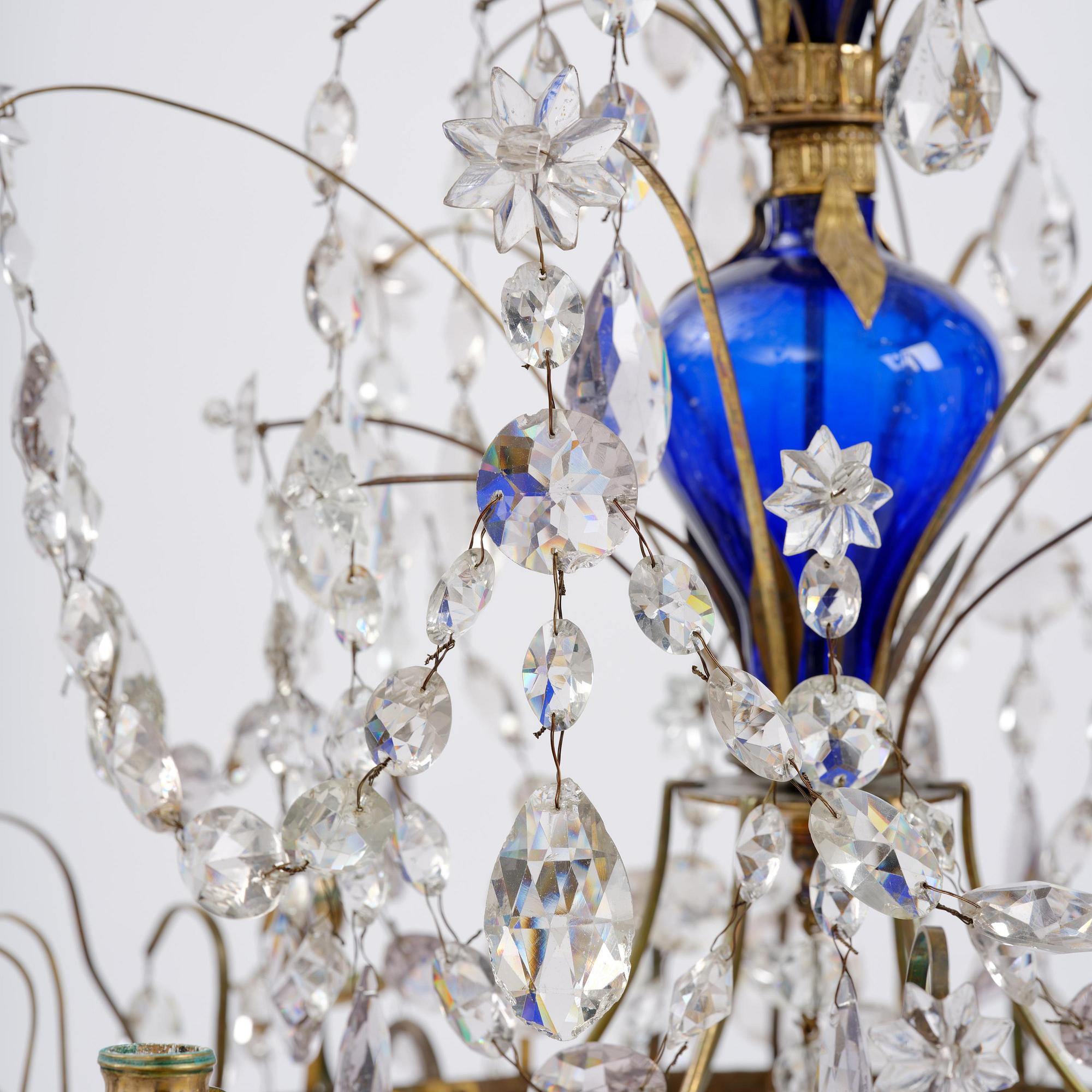 A Russian / Northern European Louis XVI-style gilt brass and blue glass six-branch chandelier, 19th century.