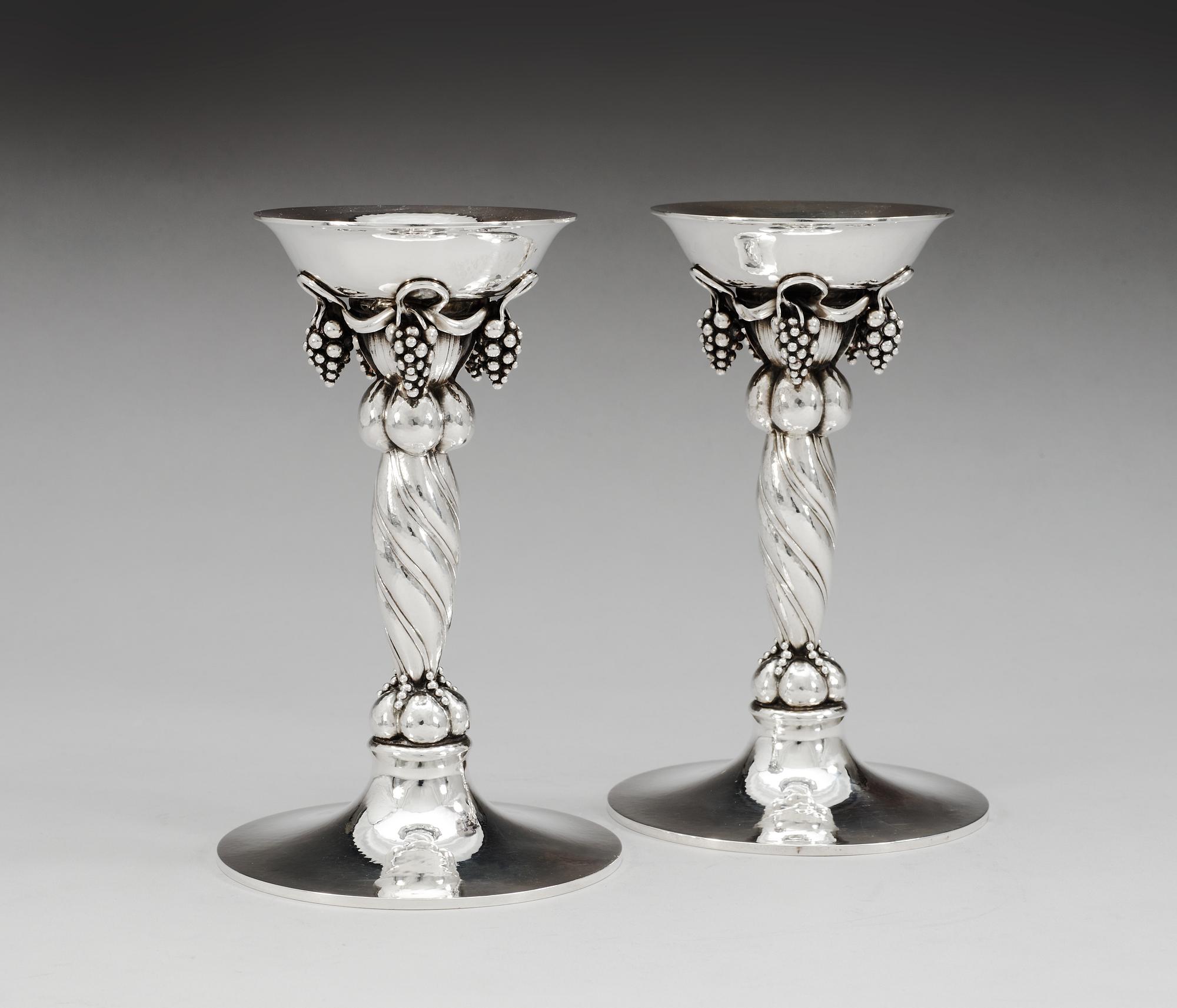 A pair of Georg Jensen sterling candlesticks, design nr 263B, Copenhagen 1945-77.