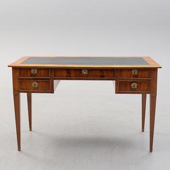 A circa 1900 late Gustavian mahogany veneered desk.