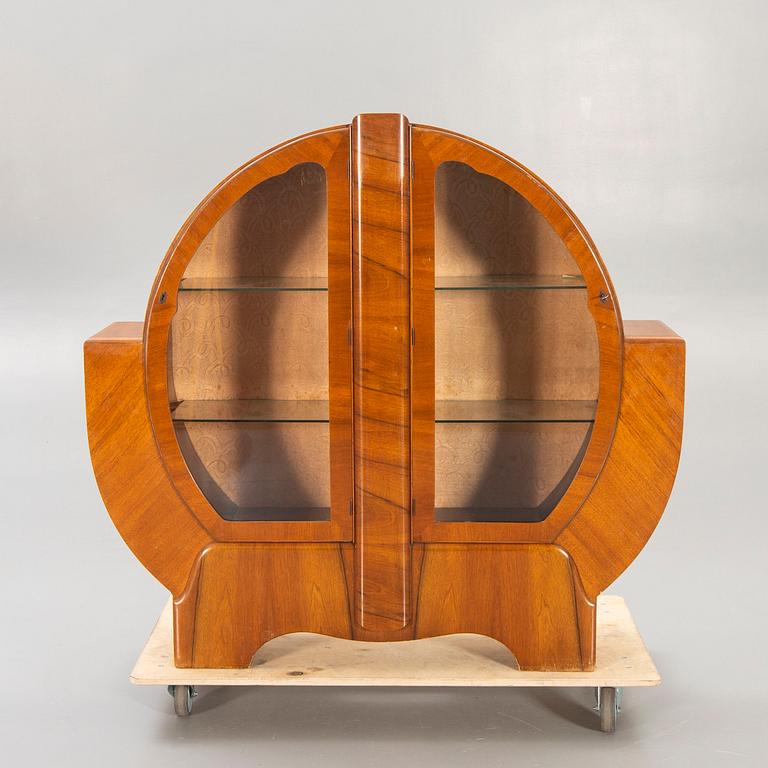 An English 1940s Art Deco walnut display cabinet.