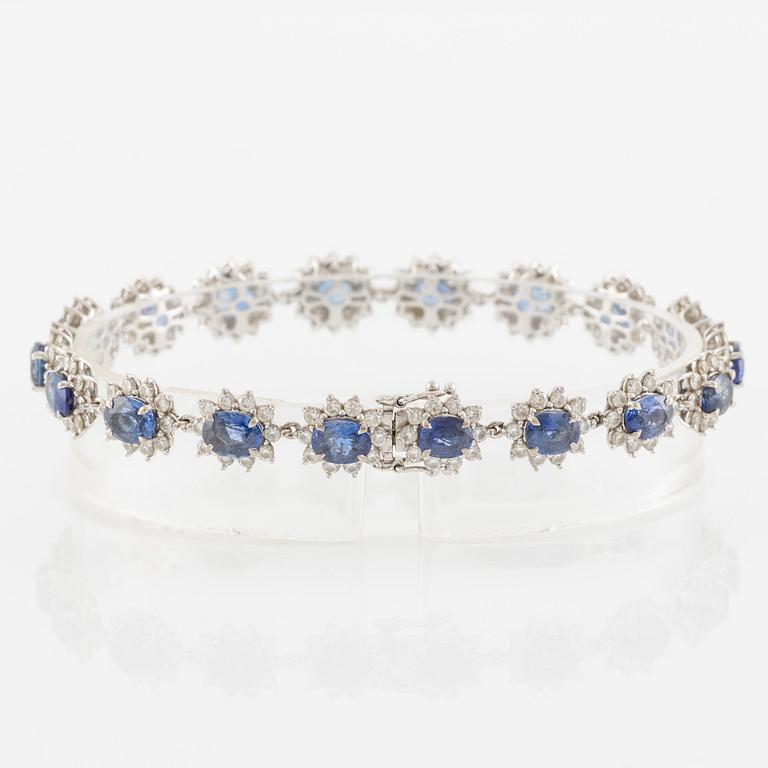 Bracelet 18K white gold with step-cut sapphires and round brilliant-cut diamonds.