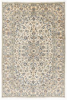 A Kashan carpet, ca 352 x 239 cm.