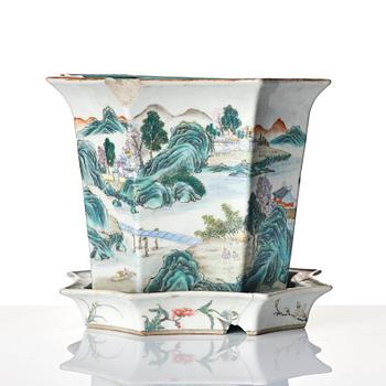 A famille rose flower pot with a stand, Qing dynasty with a Yongzheng mark.