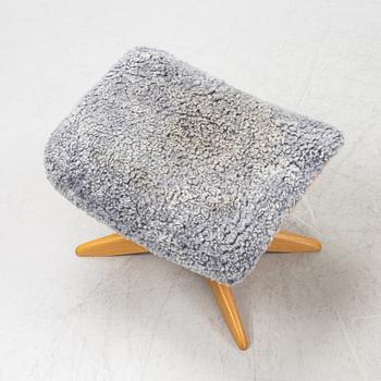 An 'Air' armchair with ottoman, Conform, 21st century.