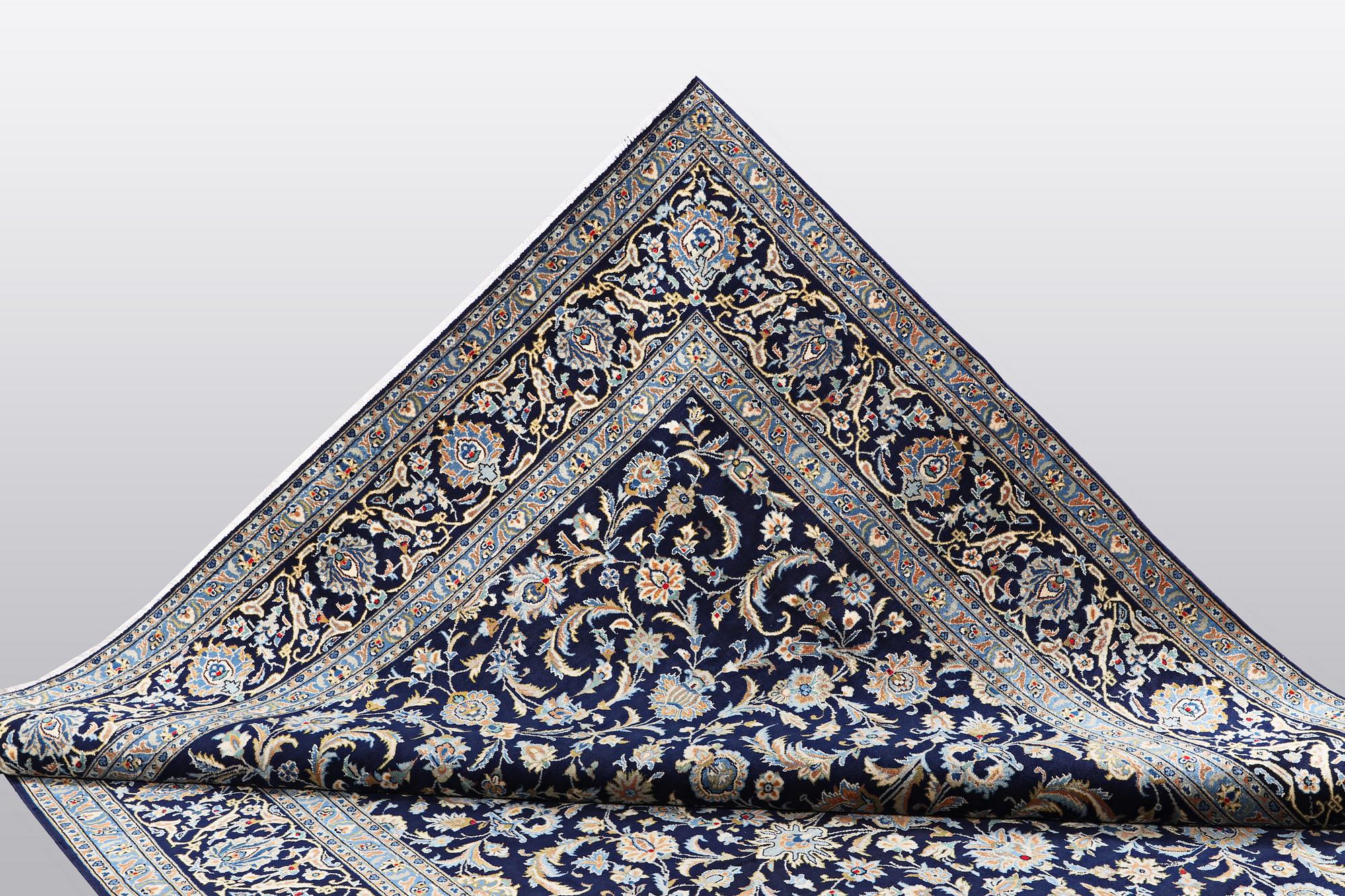 A carpat, Kashan signed Reza Torshi, ca 370 x 250 cm.