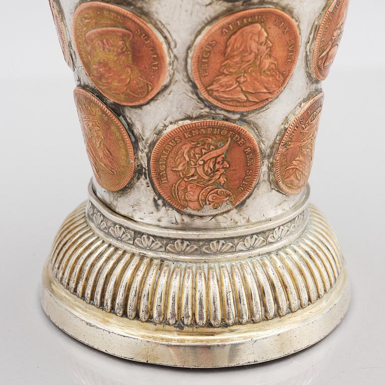 A Swedish 18th century parcel-gilt silver coin-beaker.