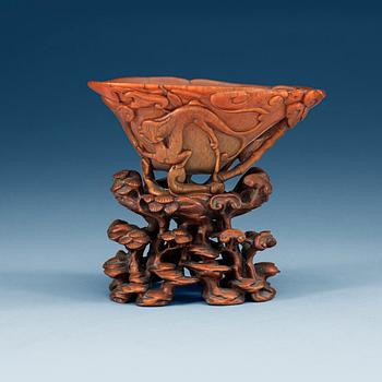 A finely carved rhinoceros libation cup, Qing dynasty, Kangxi (1662-1722).