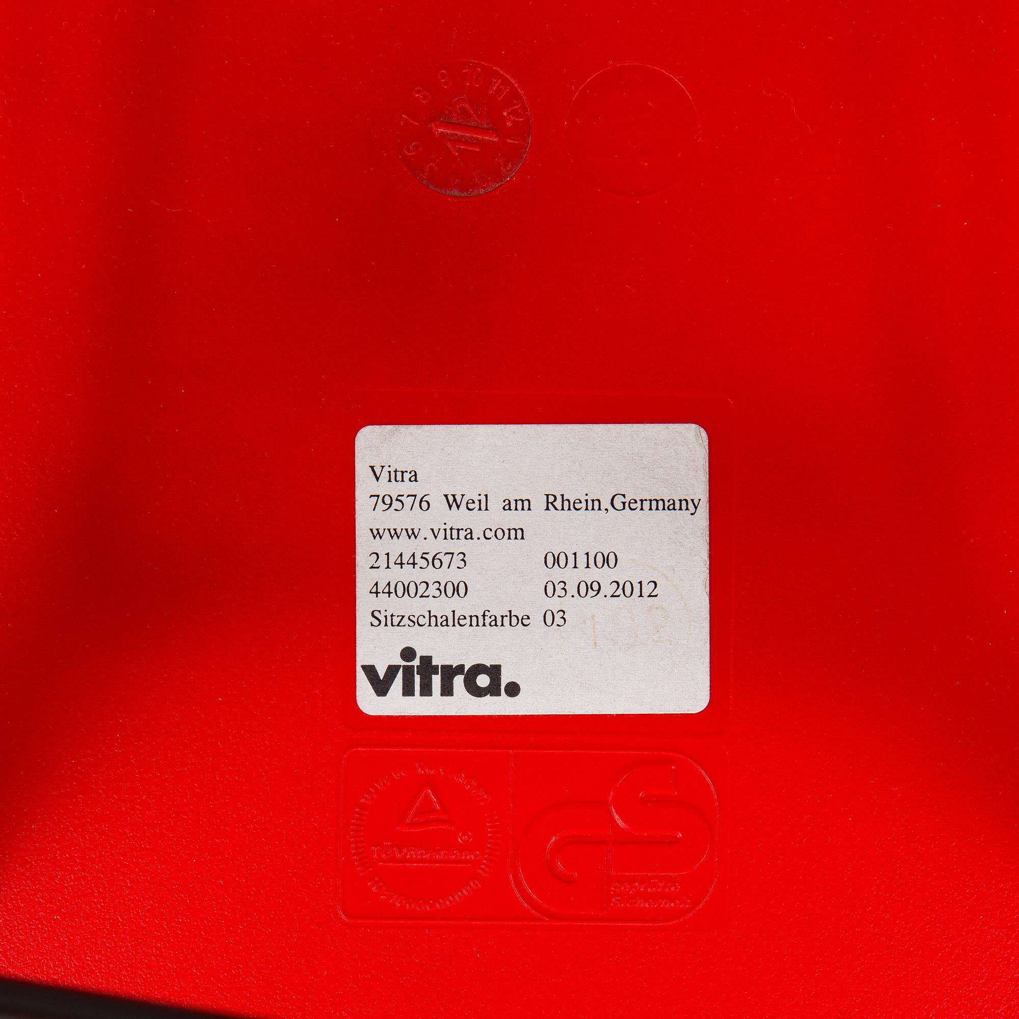 Charles & Ray Eames, two 'Plastic Chair DSW' chairs, Vitra.