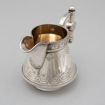 A Russian 19th century parcel-gilt silver tea pot and cream jug, mark possbly of Alexander Lokin, St. Petersburg 1893.