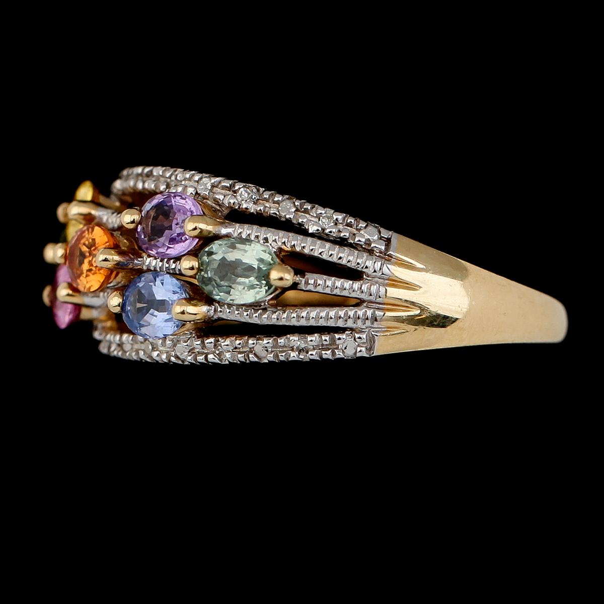 RING, 14K tvåfärgat guld, safirer och diamanter tot ca 0.04 ct. Vikt ca 4 g.