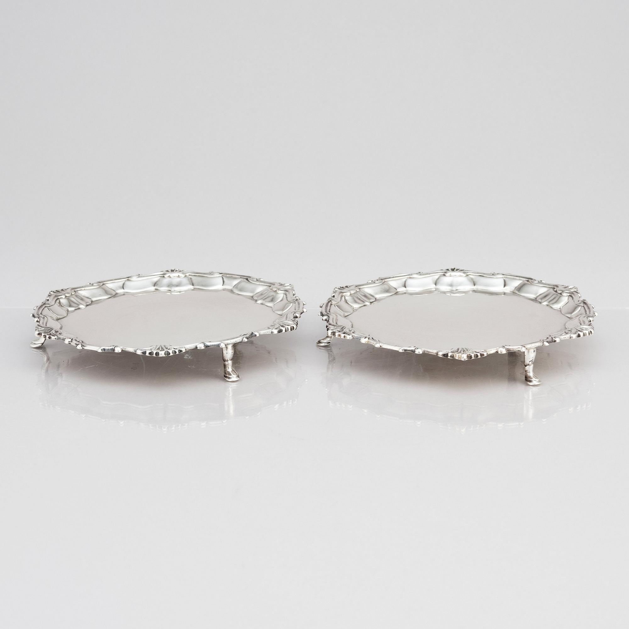 A pair of English silver salvers/plates, marks of Thomas Cooke II and Richard Gurney, London 1753.