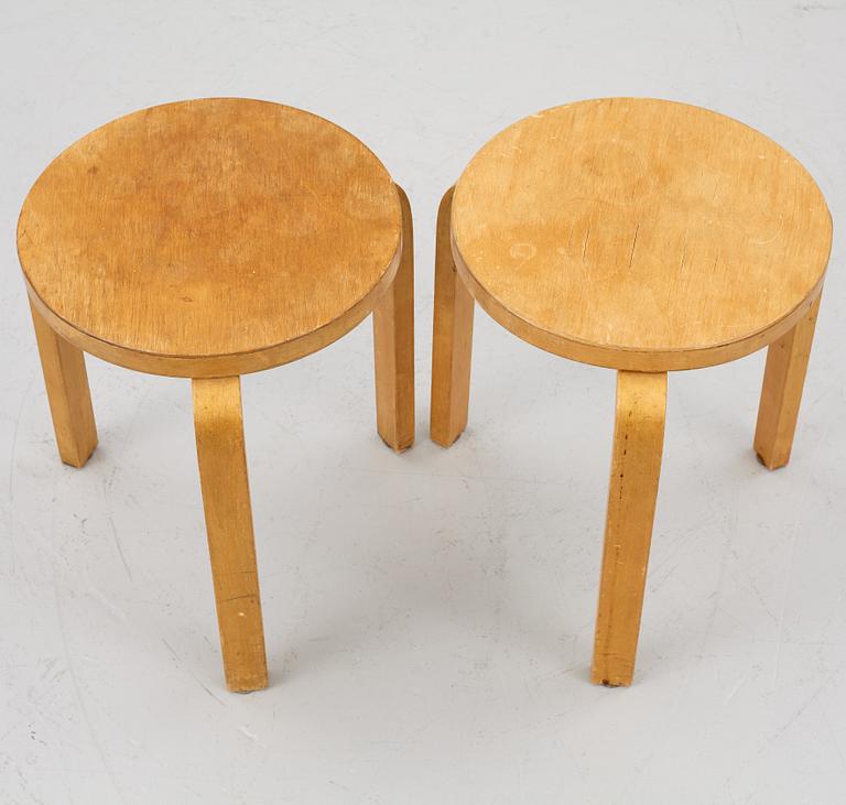 Alvar Aalto, a pair of model 60 stools, Artek, mid 20cth century.