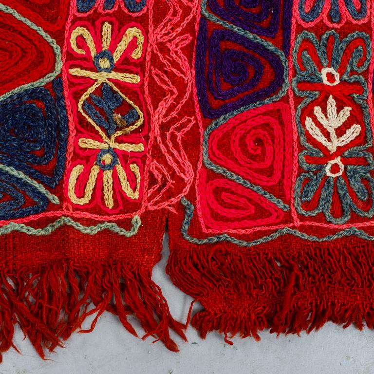 A semi-antique embroidered textile by the Marsh Arabs/nomads in Iraq, ca 235 x 146 cm.