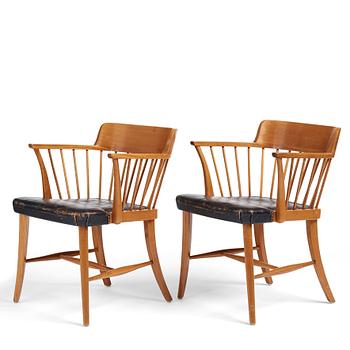 Josef Frank, a pair of mahogany and black leather 'Captain's chair', Svenskt Tenn, model 789B, acquired in 1950.