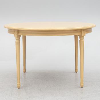 A Gustavian style dining table with six dining chairs, Sweden, 21st century.
