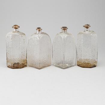 A gustavian style mahogany box with 4 glass bottles, circa 1900.
