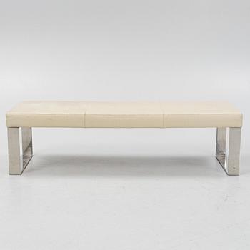 A contemporary leather upholstered bench,