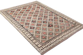 A Kilim carpet, c. 284 x 200 cm.