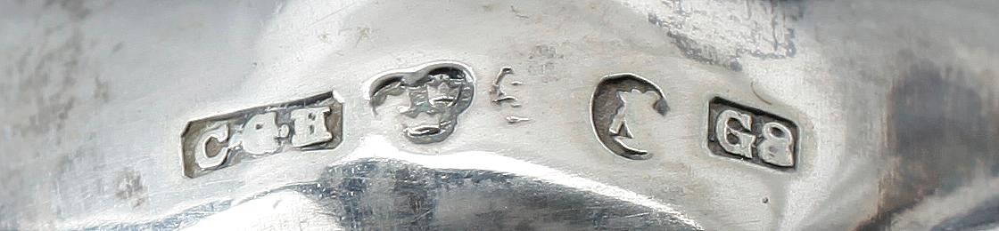 LJUSSTAKAR, ett par, silver, rokokostil, CG Hallberg, Stockholm 1933.