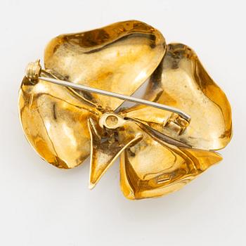 Brosch, 18K guld i form av blomma med turkoser.