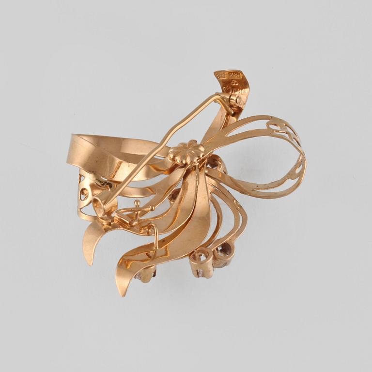BROSCH, 18K guld med 6 fasettslipade bergkristaller, Juvelfabriken, Stockholm, 1952. Vikt 4,5 gram.