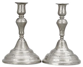 1054. A pair of Rococo pewter candlesticks by F. Ahlman, Karlskrona, Sweden 1785.