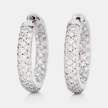 A pair of diamond hoop earrings, 2.66 cts in total.