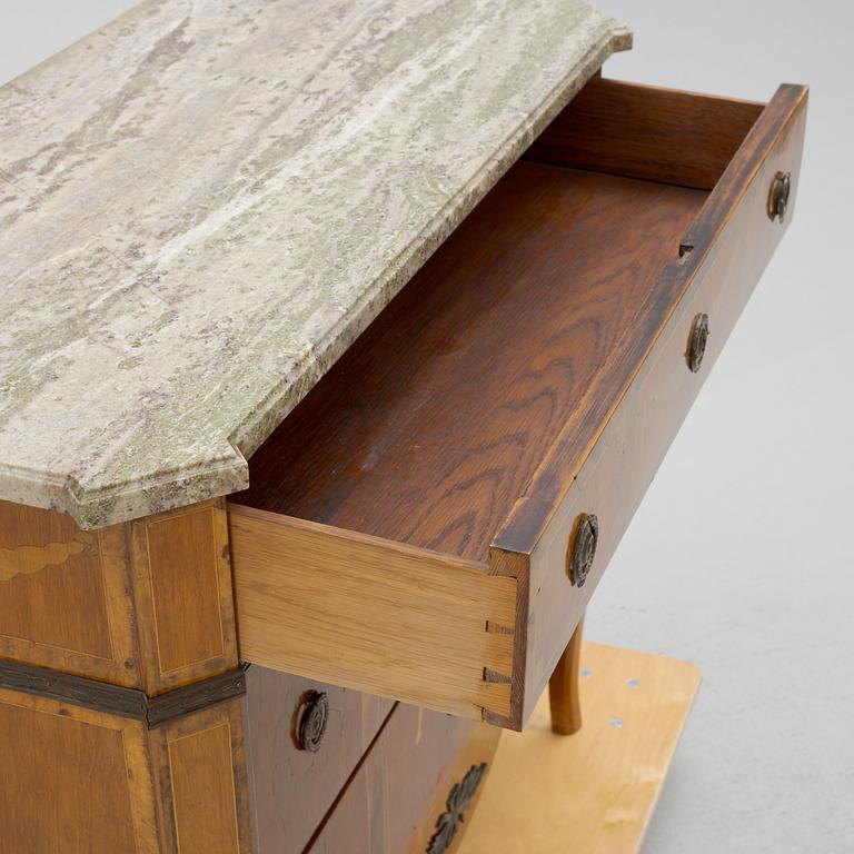 A Gustavian style chest of drawers, early 20th Century.